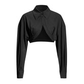 Chemise courte chic à manches longues et col rabattu, épaules tombantes, volants, ourlet incurvé